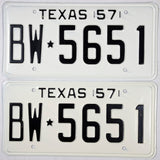 A pair of antique 1957 car license plates in excellent condition