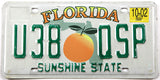 2002 Florida car license with an orange grading very good plus