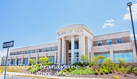 art print of college of law building on WVU campus with one way sign