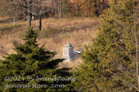 art print of 1st OH artillery monument surrounded by dried grasses and a cannon on Gettysburg battlefield