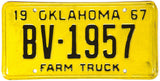 A NOS 1967 Oklahoma farm truck license plate in excellent condition